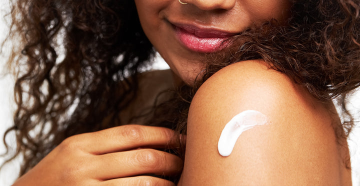 Soteri Skin moisturizer consistency on black woman's skin
